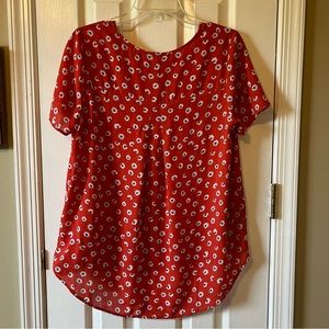 Everleigh red blouse with blue and white daisy’s size medium